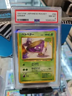 (Banned) 1997 Pokemon Japanese Rocket Grimer #88 Japanese PSA 8 - Image 1