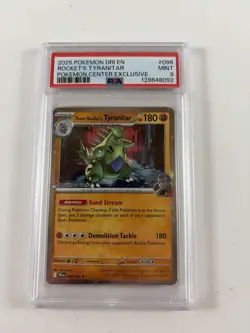2025 POKEMON DESTINED RIVALS POKEMON CENTER #096 TEAM ROCKET'S TYRANITAR PSA 9 - Image 1