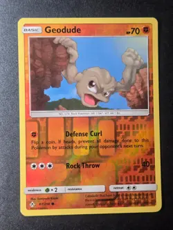 Geodude 87/214 NM Unbroken Bonds Common Pokemon Reverse Holo - Image 1
