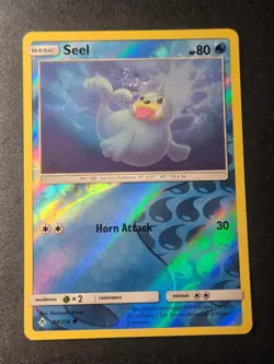 Seel 44/214 NM Unbroken Bonds Common Pokemon Reverse Holo - Image 1