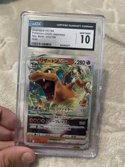 2022 POKEMON JAPANESE CHARIZARD VSTAR STAR BIRTH HOLO 015/100 CGC 10 - Image 1