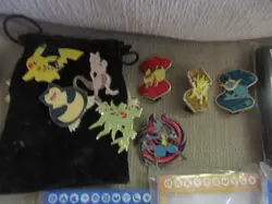 Lot of Pokemon TCG Items Vintage Coins, Pins, Deck Sleeves, Binders and Figure - Image 3