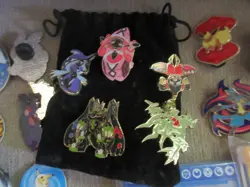 Lot of Pokemon TCG Items Vintage Coins, Pins, Deck Sleeves, Binders and Figure - Image 4