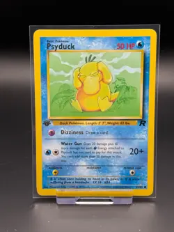 Psyduck 65/82 Team Rocket 1st Edition LP Pokemon Card TCG Vintage WOTC - Image 1