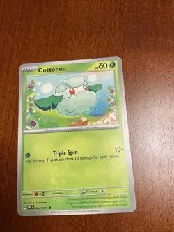 Cottonee 007/131 Prismatic Evolutions Regular Pokemon TCG Card - Image 1