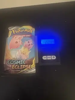 Pokemon Cosmic Eclipse Booster Pack Weighted - Image 1