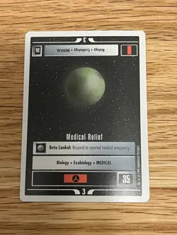 Star Trek CCG 1e Medical Relief mint/nm rare - Premiere WB Alpha 199 Mint Card - Image 1