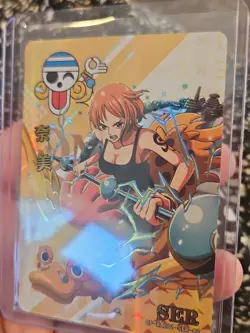 One Piece NAMI Foil Holo RARE OP-WA201-SER-03 Gold Full Art SECRET RARE - Image 2