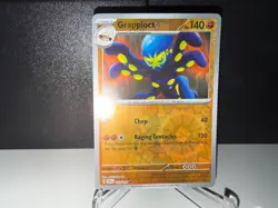 2024 Pokemon TCG Grapploct 113 Surging Sparks Reverse Holo Card NM+ - Image 1