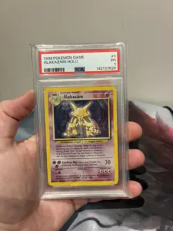 PSA 1 1999 POKEMON BASE SET #1 ALAKAZAM-HOLO - Image 1