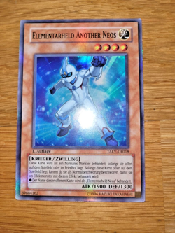 YuGiOh Elementarheld Another Neos TAEV-DE018 Super Rare Deutsch 1. Auflage - Image 1