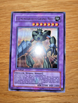 Elementarheld Grand Neos Ultra Rare 1. Auflage STON-DE035 Yu-Gi-Oh! Deutsch - Image 1