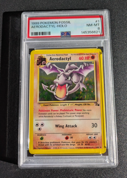 Vintage WOTC 1999 Pokemon Aerodactyl Fossil 1/62 Holo Unlimited PSA 8 Nm-Mint - Image 1