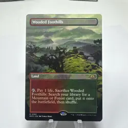 Wooded Foothills (Borderless) Modern Horizons 3 Regular MTG 0361 NM - Image 1