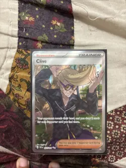 Clive 227/091 Full Art Trainer Paldean Fates Pokemon TCG NM/MINT - Image 1