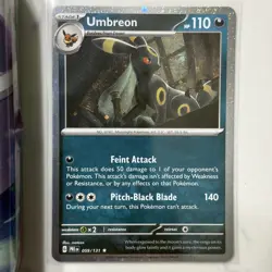 Pokemon Umbreon 059/131 (Cosmos Holo) Prismatic Evolutions Exclusive Tin Art - Image 5
