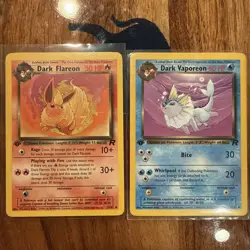 Dark Flareon 35/82 and Dark Vaporeon 45/82 1st Edition Pokemon Cards - Image 1