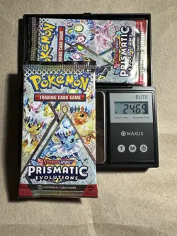 Pokemon Prismatic Evolutions Heavy Packs-Sealed-24.69g & 24.49g Get The Pair - Image 1