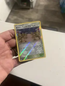 Brock's Pewter City Gym 54/68 Reverse Holo Pokemon SM Hidden Fates NM condition - Image 1