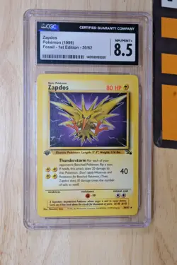 1999 Pokemon 1st Edition Fossil 30/62 Zapdos CGC 8.5 NM-MINT+ - Image 1