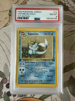Pokemon TCG Vaporeon 1st Edition Holo Rare PSA 8 - Image 1