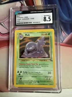 Muk 1999 Fossil Unlimited 13/62 Holo Rare Pokemon Card CGC 8.5 psa NM - Image 1