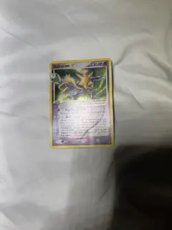 Alakazam Gold Star Holo Pokemon Card 99/100 Crystal Guardians Series (Damaged) - Image 2