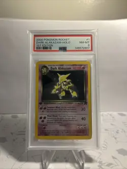 2000 Pokemon Team Rocket Dark Alakazam 1st Edition Holo #1/82 (PSA 8) - Image 1