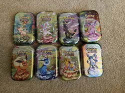 Prismatic Evolutions *EMPTY* Mini Tin Complete Set Of 8 (Tin + Card + Coin) - Image 1