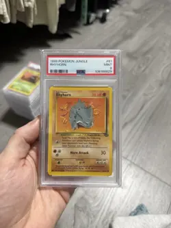 Pokemon 1999 Rhyhorn #61 PSA 9 - Image 1
