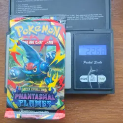 Pokemon Tcg Mega Evolution phantasmal flames Heavy 22.68g Booster Pack Sealed - Image 1