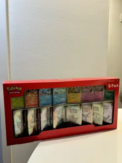 Costco Pokemon TCG Scarlet & Violet Prismatic Evolutions 8-Pack Mini Tin - Image 1