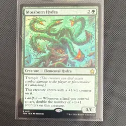 Wizards of the Coast MTG Mossborn Hydra Foundations Rare 0107 Regular - Image 1