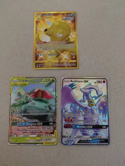 Pokemon lot of 3, Celebi & Venusaur GX, Gold Octillery, and Shiny Rishiram GX - Image 1