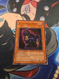 A Cat of Ill Omen PGD-070 Yugioh Card - Unlimited - Lightly Played Condition - Image 1