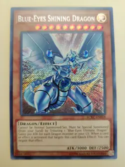 Blue-Eyes Shining Dragon LCKC-EN008 Secret Rare Unlimited LP - Image 1