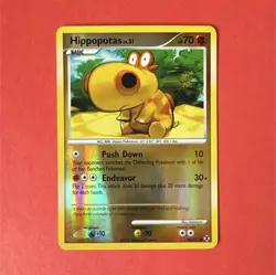 The Pokemon Company Hippopotas 64/111 Rising Rivals Reverse Holo Common ENG - Image 1