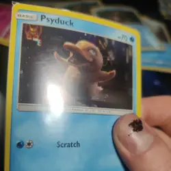 SM199 Psyduck Holo Promo Pokemon Card Detective Pikachu SEALED SWIRL - Image 1