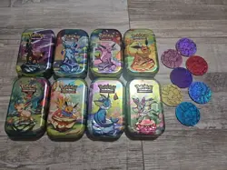 Pokemon Eevee Evolutions Tin Set of 8 With 7 Coins Great Condition - Image 1