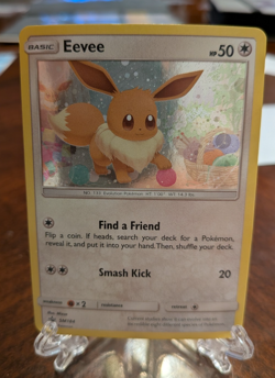 Pokemon TCG - Eevee - Black Star Promo - SM184 - Cosmos Holo - NM - Image 1