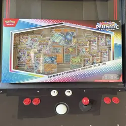 Pokemon TCG Prismatic Evolutions Lucario Ex + Tyranitar Ex Premium Collection - Image 1