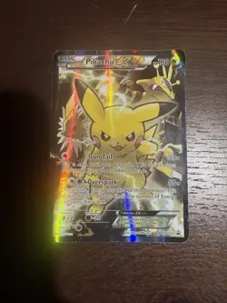 Pikachu EX XY124 XY Holo Card Is Slightly Ripped - Image 1