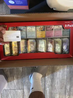 Costco Pokemon Prismatic Evolutions 8 Mini Tins 2 Pack - Image 1