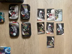 Pokemon 4x Lunchbox Tins + 7x Tins Pokemon Cards & Stickers & 14xPocket Binders - Image 3