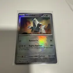 POKEMON TCG DURALUDON 069/131 MASTERBALL HOLO RARE NM PRISMATIC EVOLUTIONS - Image 1