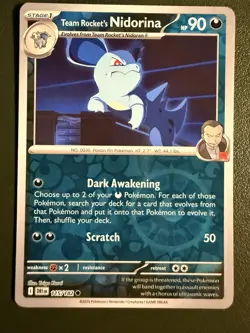 Pokemon TCG Team Rocket's Nidorina 115/182 Destined Rivals Scarlet & Violet Reve - Image 1