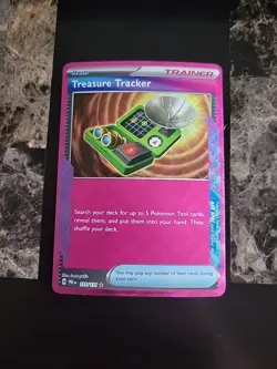 Treasure Tracker - 131/131 - Ace Spec - Pokemon Prismatic Evolutions - NM - Image 1