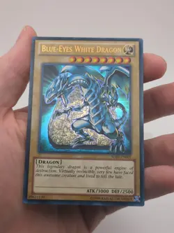 PACK FRESH - YUGIOH Ultra Rare Blue-Eyes White Dragon SDBE-EN001 1st Edition - Image 1
