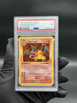 1999 Pokemon Base Set 1st Edition Shadowless Charizard #4 THICK STAMP - PSA 7 - Image 1