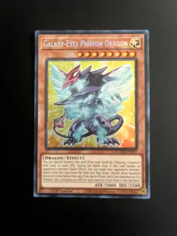YUGIOH GALAXY-EYES PHOTON DRAGON SECRET RARE BLMM-EN007 NM/M - Image 1
